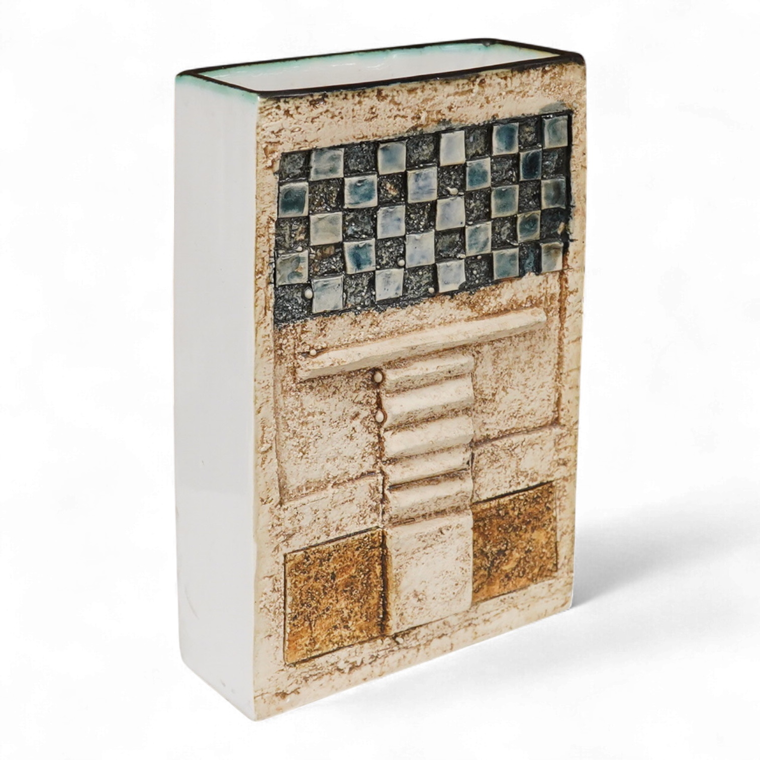 A Troika vase by Linda Taylor, decorated in relief with an abstract design, signed to the base, 17cm high